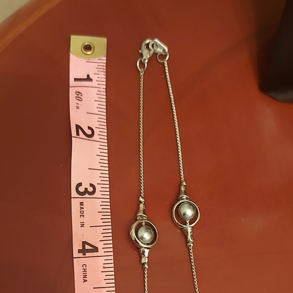 Silver tone and faux pearl long necklace - Picture 9 of 11